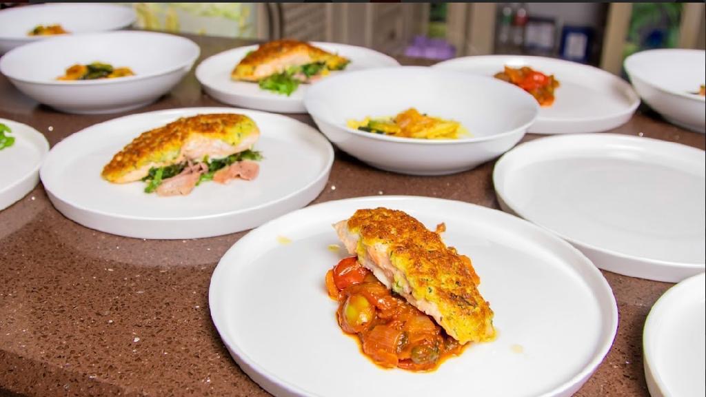 Plated main course with vegetables and sauce