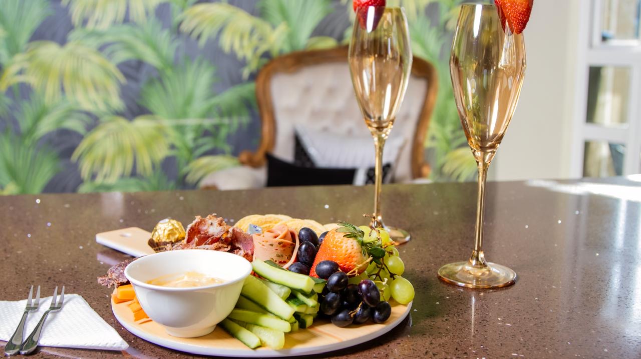 Sharing platter served with sparkling wine at Cherry Nest